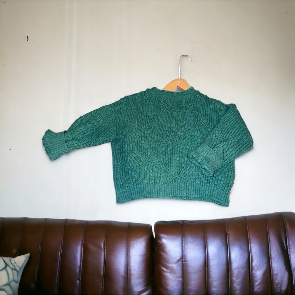 Girl’s Shein sweater in teal